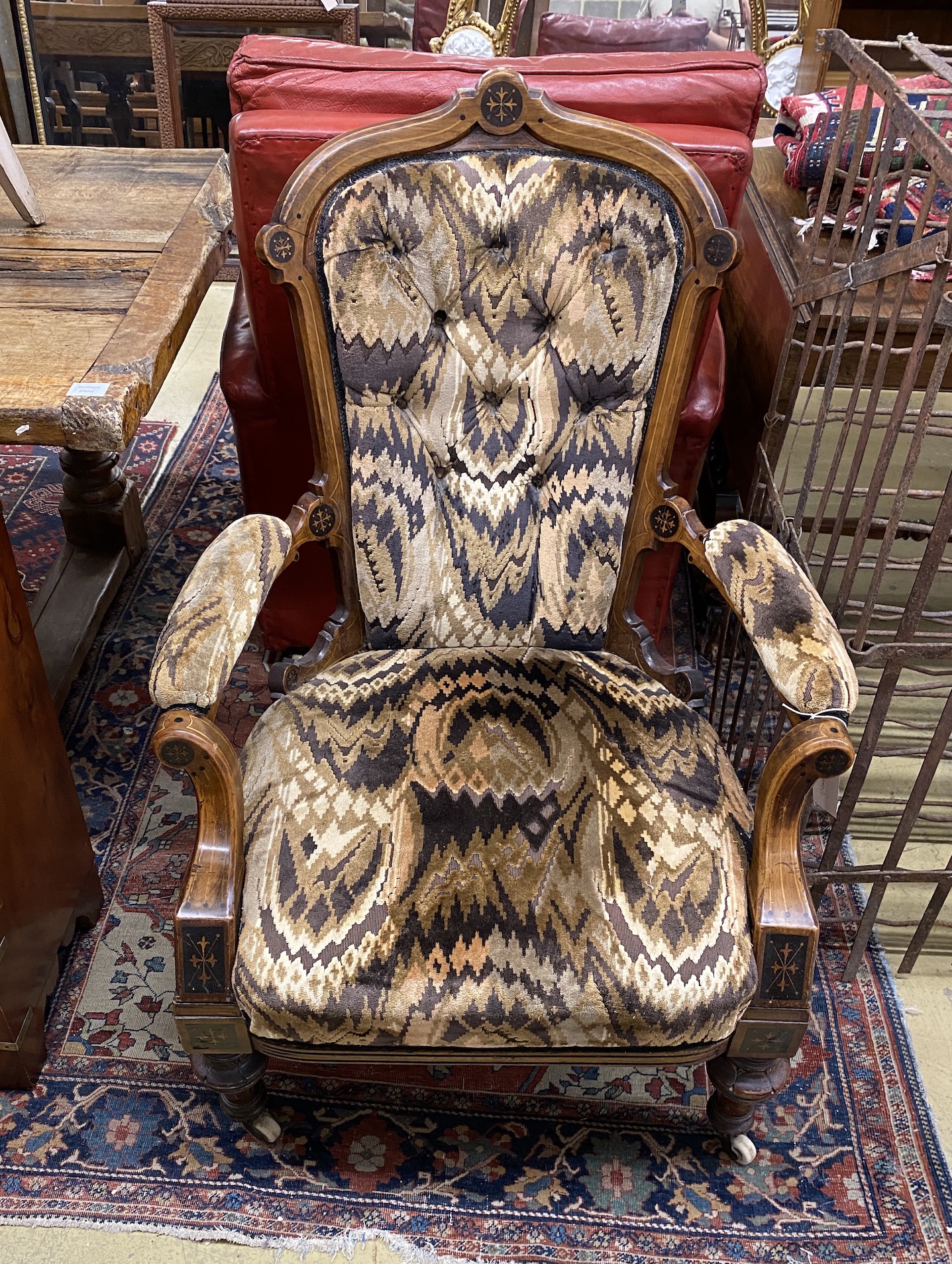 A late Victorian inlaid walnut open armchair, width 73cm, depth 56cm, height 102cm